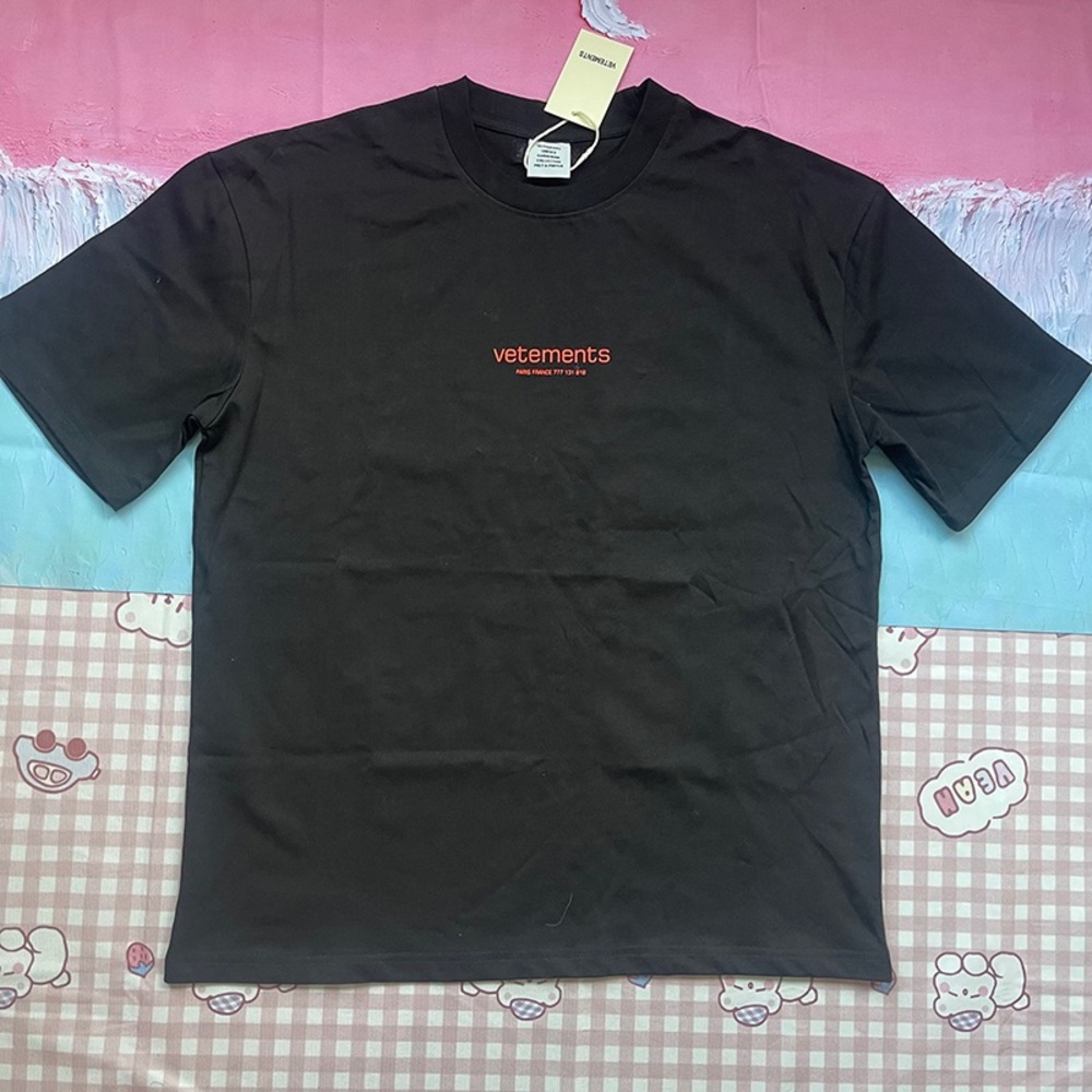Vetements Black T-Shirt with Orange Logo Center Chest